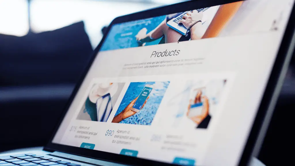 Laptop shoing a website's landing page that has been optimized with SEO for beginners. It contains silos and is selling it's products in each one.
