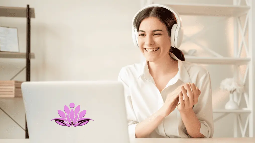 Female business coach sitting in front of the computer